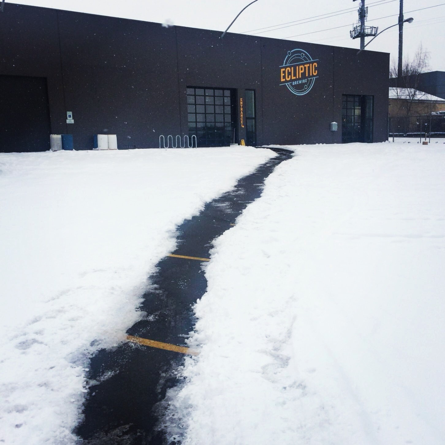 Path Through Snow To Ecliptic Brewing Entrance The Gallery